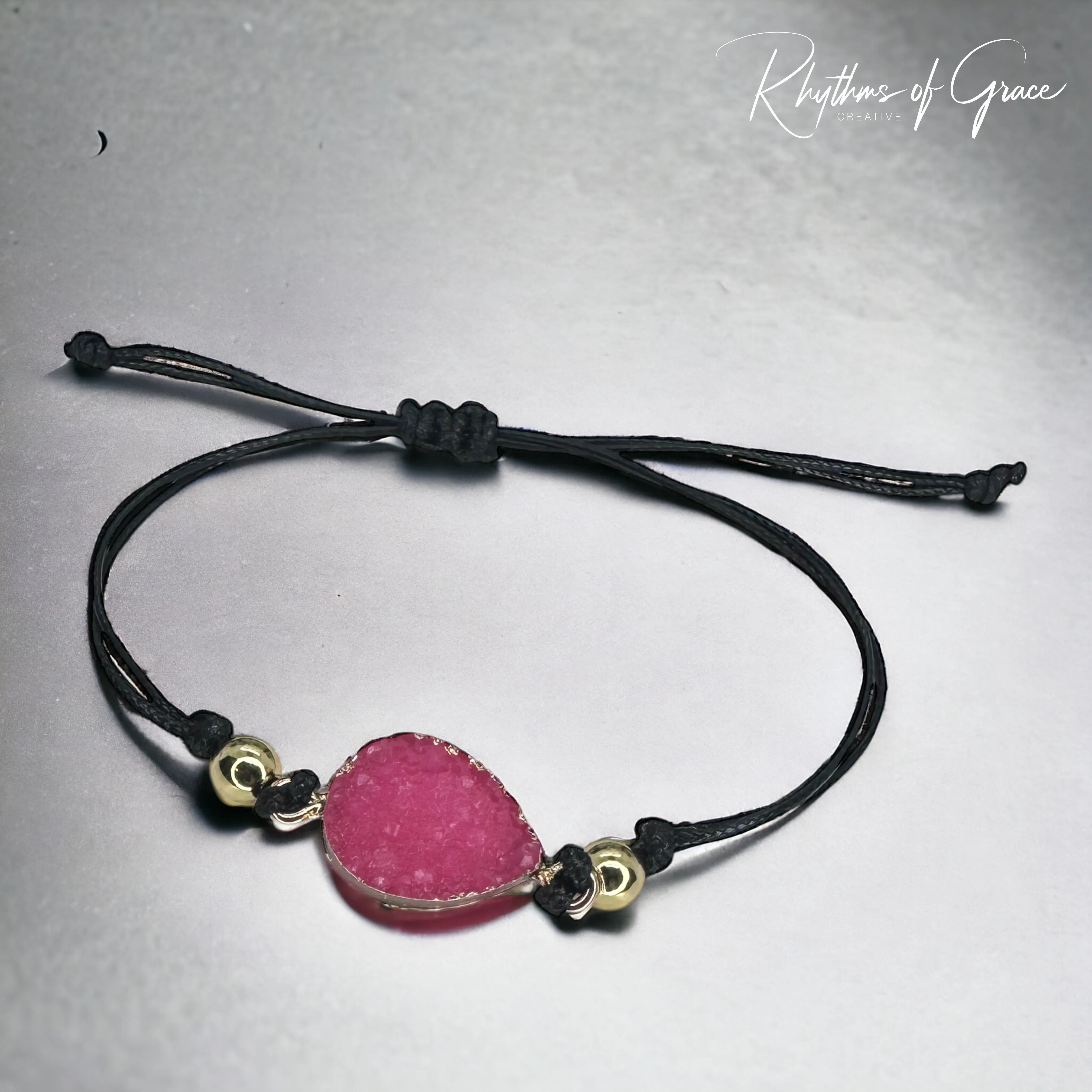 Black Leather Bracelet with Gold and Pink Charm