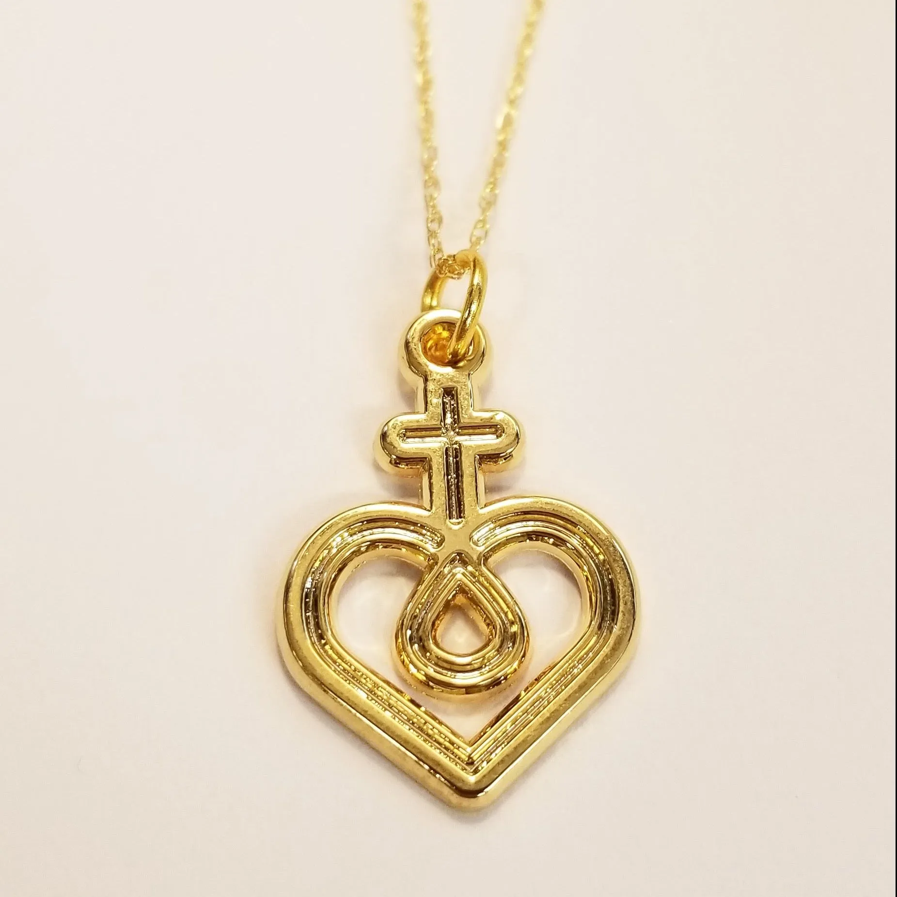 Necklace — Gold Toned Logo Pendant