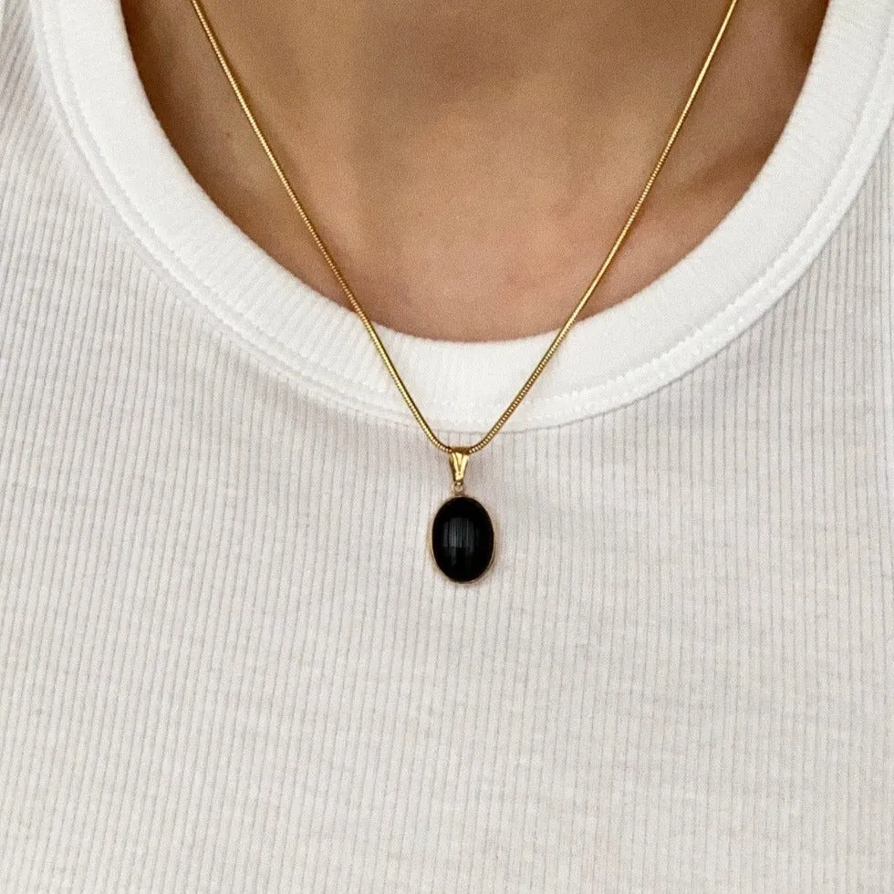 Tethys 14k Onyx Pendant